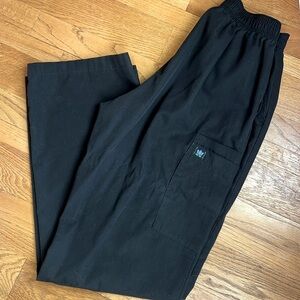 Black szS elastic waist scrub pants . Side , thigh and back pockets
